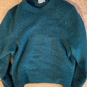 fuzzy green sweater